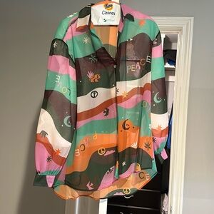 Never fully dressed us size 6 multi love sheer blouse, worn once. Too big for me